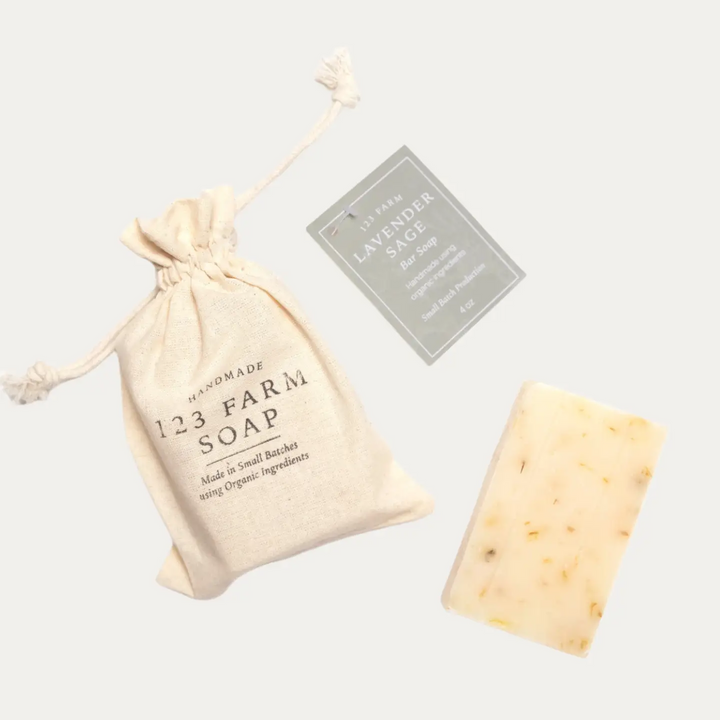 Bar of soap with a drawstring bag labeled '123 Farm Soap' on a light gray background

Crafted in small batches with organic ingredients. Made with nourishing sunflower oil, coconut oil, and ethically sourced palm oil.

Available at Luca Essentials in Los Angeles. 