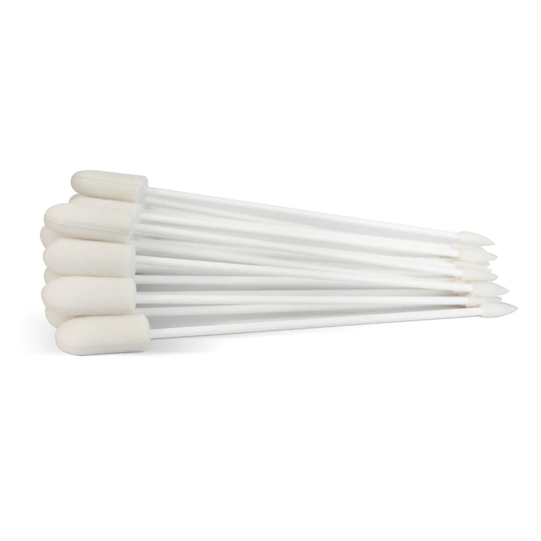 Set of white foam swab sticks on a white background. Pure and Natural Pet is available at Luca Essentials in Los Angeles.