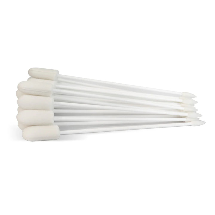 Set of white foam swab sticks on a white background. Pure and Natural Pet is available at Luca Essentials in Los Angeles.