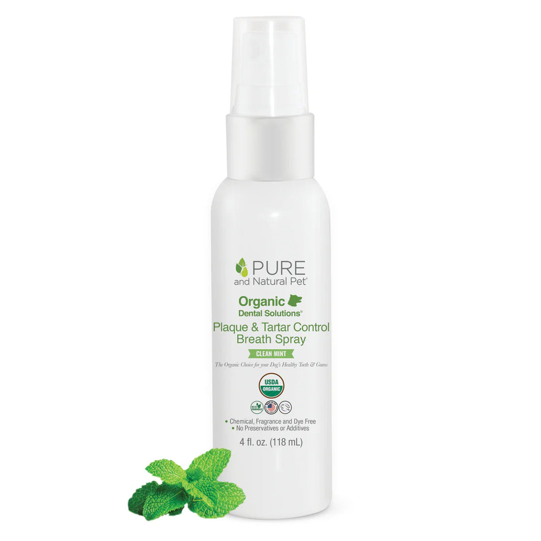 White bottle of Pure and Natural Pet Plaque & Tartar Control Breath Spray for dogs with mint leaves on a white background. Available at Luca Essentials in Los Angeles.