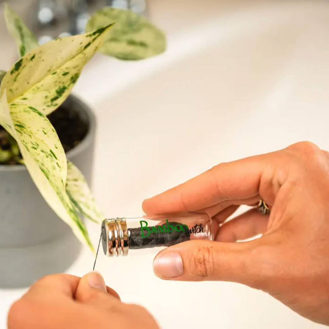 Floss in Glass Bottle