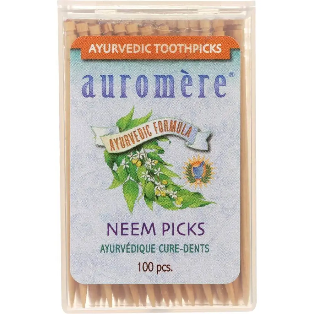 Auromère Ayurvedic toothpicks packaging with neem leaves on a white background. Available at Luca Essentials in Los Angeles.
