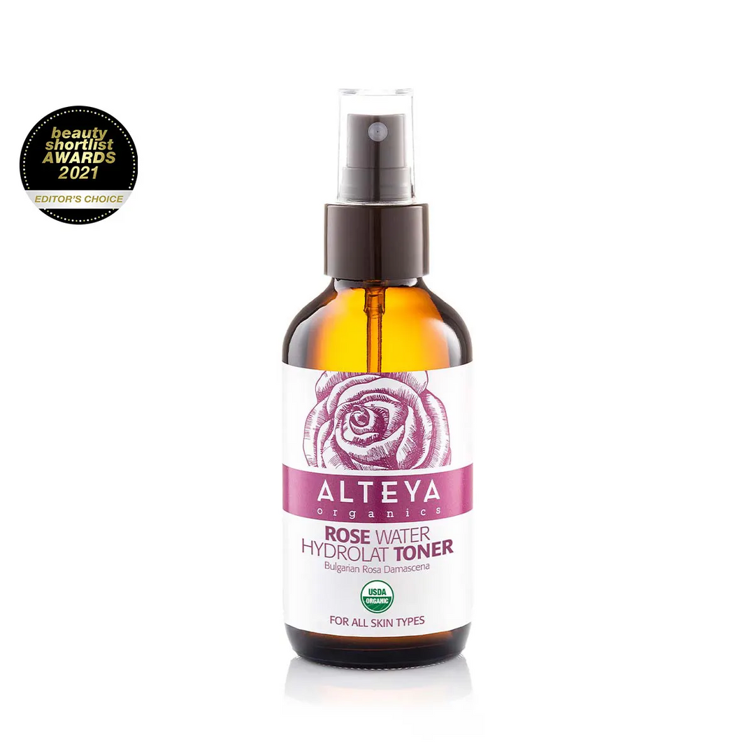 Alteya Organics rose water toner bottle with a rose design on the label against a white background. Available at Luca Essentials in Los Angeles.
