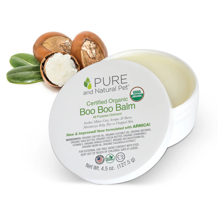 Pure and Natural Pet Certified Organic Boo Boo Balm with ingredients on a white background. Available at Luca Essentials in Los Angeles.