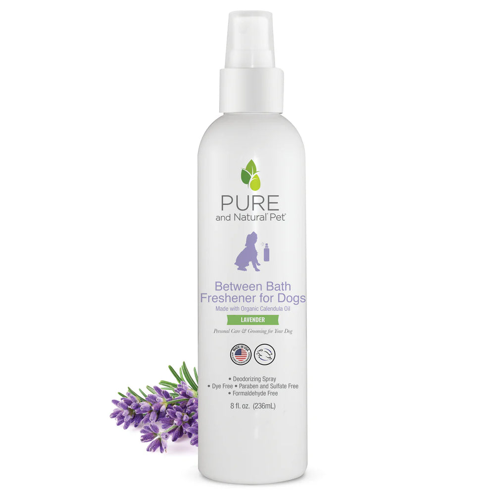 Bottle of Pure and Natural Pet Between Bath Freshener for Dogs on a white background with lavender. Available at Luca Essentials in Los Angeles.