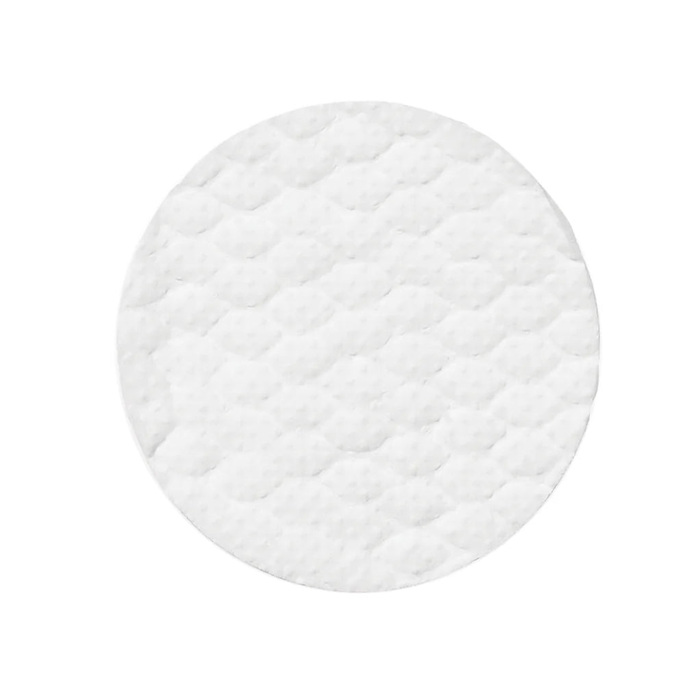 Round white quilted Pure and Natural Pet Tear Stain Removing Under Eye Wipe on a white background. Available at Luca Essentials in Los Angeles.