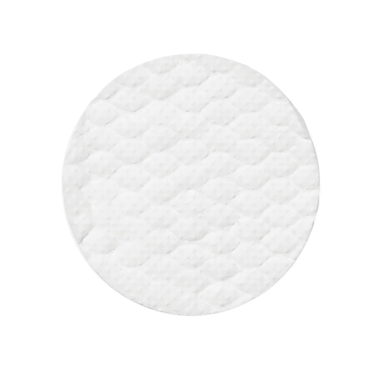 Round white quilted Pure and Natural Pet Tear Stain Removing Under Eye Wipe on a white background. Available at Luca Essentials in Los Angeles.