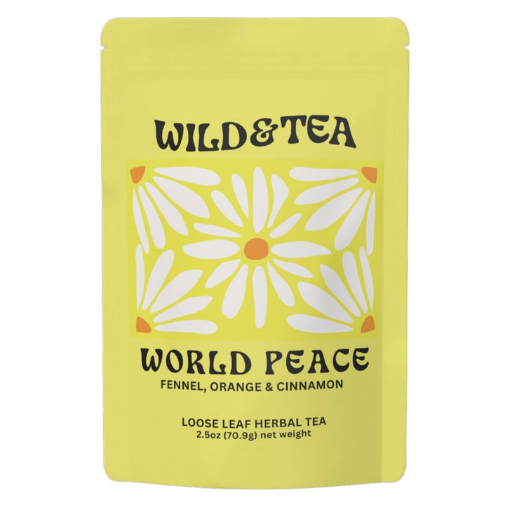 A yellow stand-up pouch of Wild & Tea World Peace Fennel, Orange & Cinnamon loose leaf herbal tea, featuring a retro daisy pattern on the front. Available at Luca Essentials in Los Angeles. 
