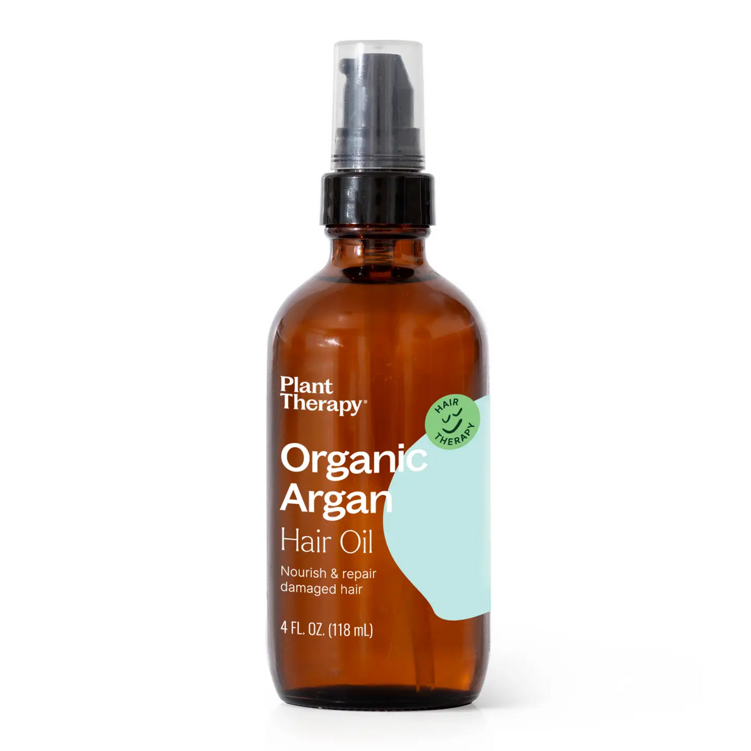 Brown glass bottle of Plant Therapy Organic Argan Hair Oil on a white background. Available at Luca Essentials in Los Angeles.