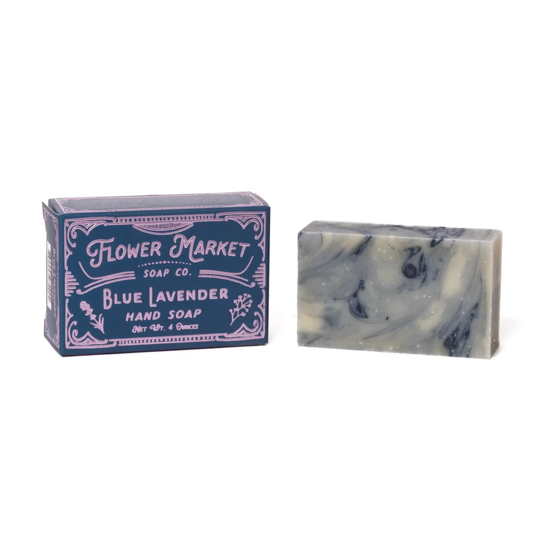 Blue lavender hand soap with blue and purple packaging on a white background. Available at Luca Essentials in Los Angeles. 