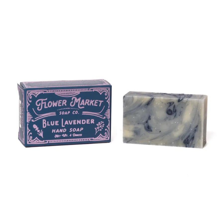 Blue lavender hand soap with blue and purple packaging on a white background. Available at Luca Essentials in Los Angeles. 