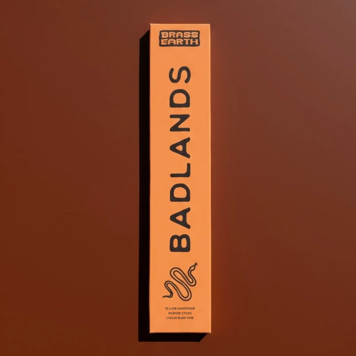 Brass Earth Badlands product packaging on a brown background

A truly unique scent experience. 15 lovingly handmade incense by The Brass Hand/Brass Earth team, with a 1+ hour burn time, lingering fragrance, and addictive aromas.

Available at Luca Essentials in Los Angeles. 