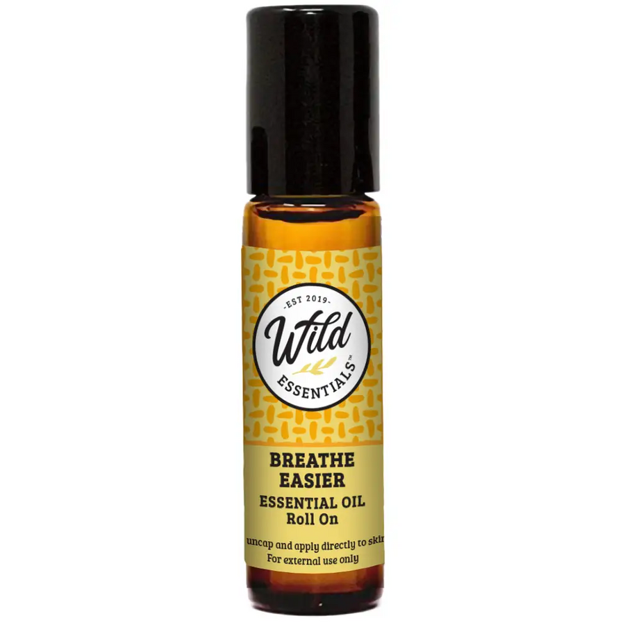 Wild Essentials Breathe Easier essential oil roll-on bottle with yellow label on a white background. Available at Luca Essentials in Los Angeles. 