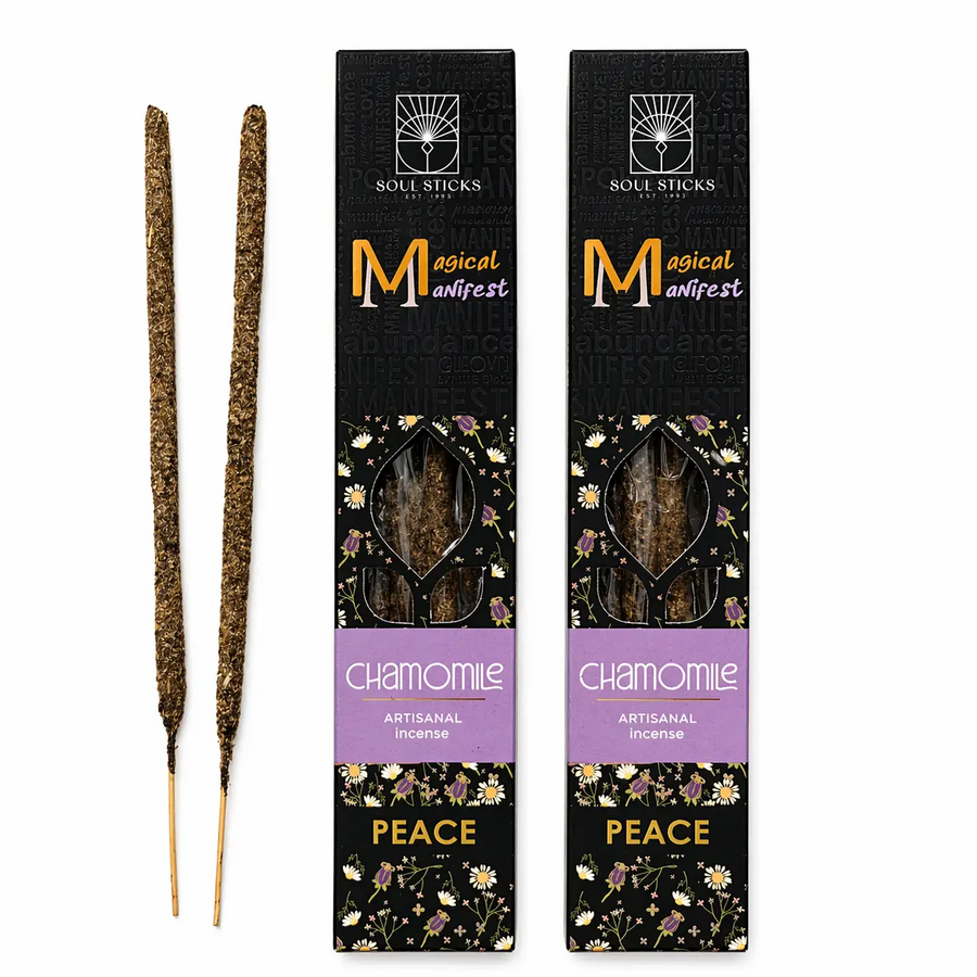 Two boxes of Chamomile incense sticks with packaging labeled 'Magical Manifest' and 'Peace' and two incense sticks beside them. Available at Luca Essentials in Los Angeles. 