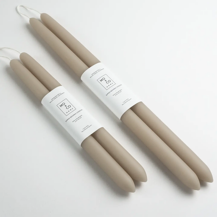 Set of beige candles with white labels on a light gray background

Dipped 100% Beeswax Candles 10" or 14" Long

Available at Luca Essentials in Los Angeles. 