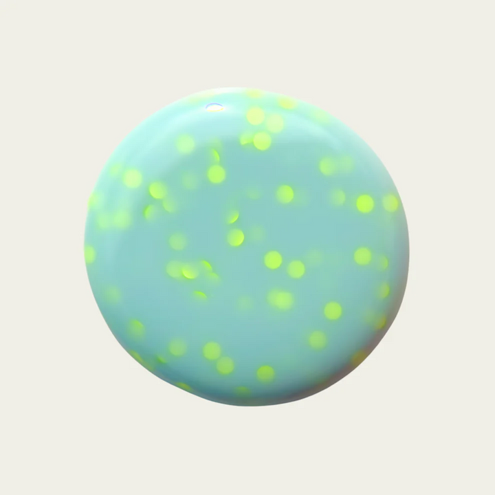 sea foam blue/green swatch with green speckles on a light gray background. Available at Luca Essentials in Los Angeles. 