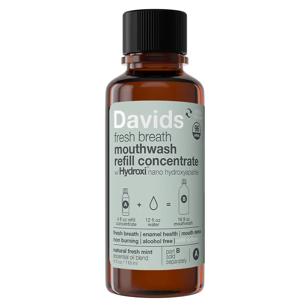 Brown bottle of Davids fresh breath mouthwash refill concentrate on a white background

Davids Hydroxi™ mouthwash concentrate uses& nano hydroxyapatite, a mineral proven to remineralize enamel, support sensitive teeth, and strengthen your enamel over time. As you swish this nano hydroxyapatite mouthwash, its particles bond with the surface of your teeth to help diminish microscopic damage.

Available at Luca Essentials in Los Angeles.
