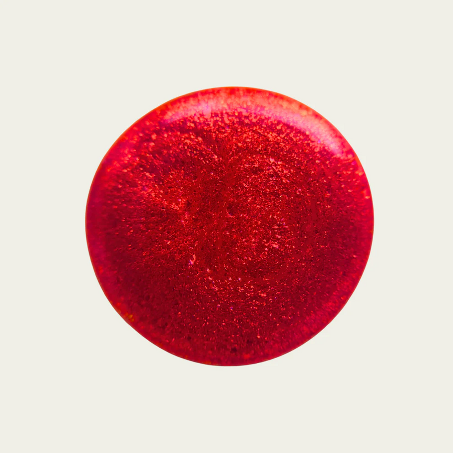 Metallic red circular swatch on a light gray background

High-impact molten garnet metallic red. Easy coverage and build-up, this dense micro-shimmer gives a foil-like reflective red glow.

Available at Luca Essentials in Los Angeles. 