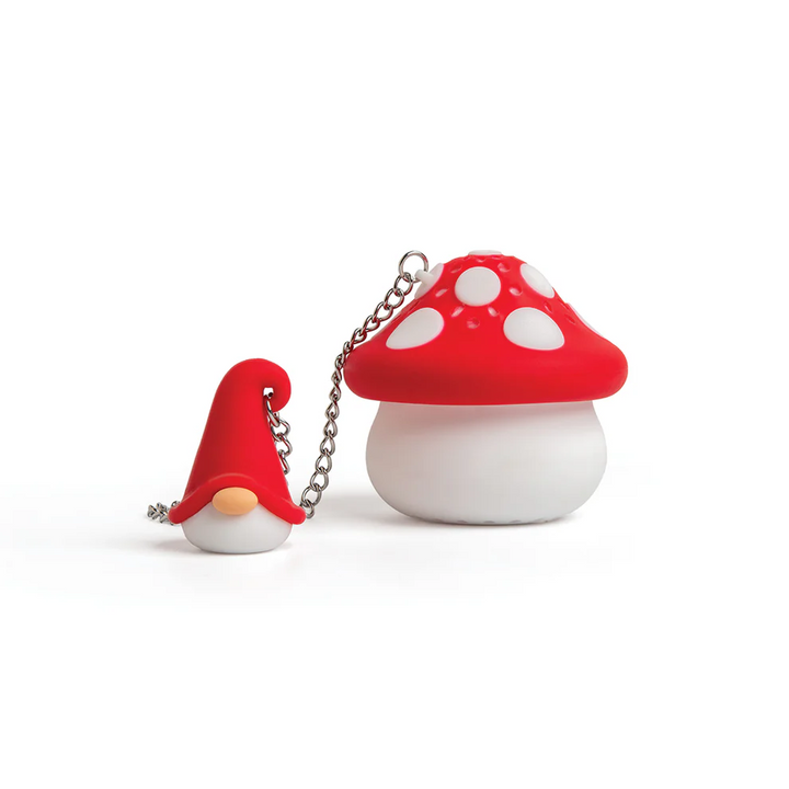 Red mushroom-shaped chain with a small gnome figure on a white background. Available at Luca Essentials in Los Angeles. 