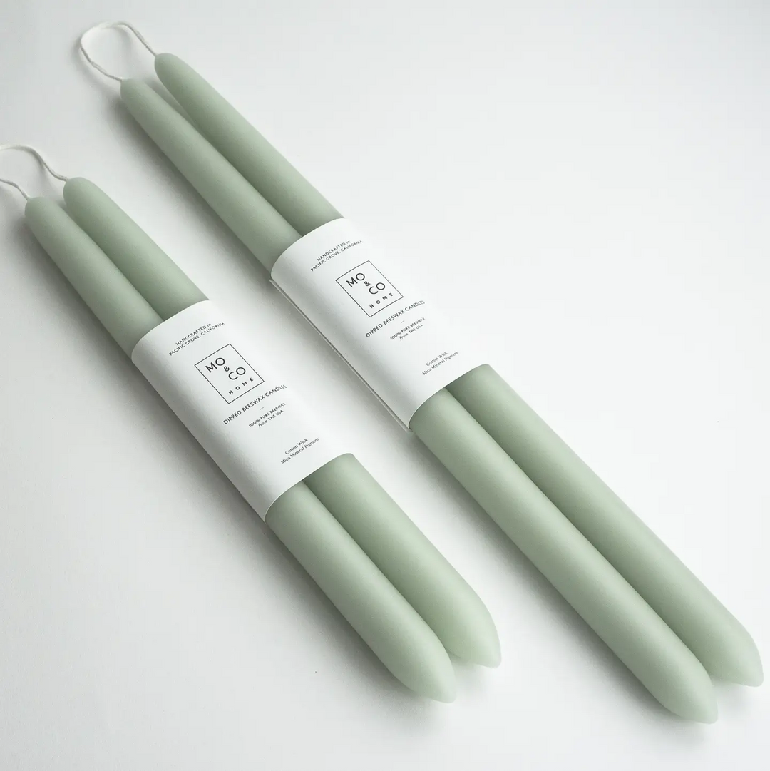 Set of green candles with white labels on a light gray background

Dipped 100% Beeswax Candles 10" or 14" Long

Available at Luca Essentials in Los Angeles. 