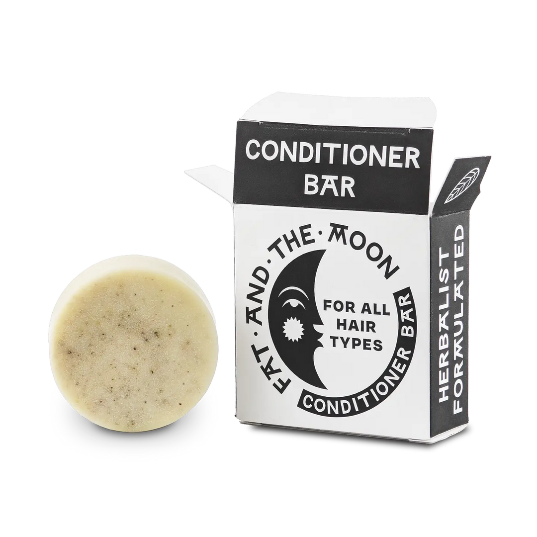 Conditioner bar with packaging on a white background

A botanically boosted, concentrated conditioner bar that softens all hair types without any heavy residue. Gently seals in moisture for manageable and bouncy locks.

Available at Luca Essentials in Los Angeles. 