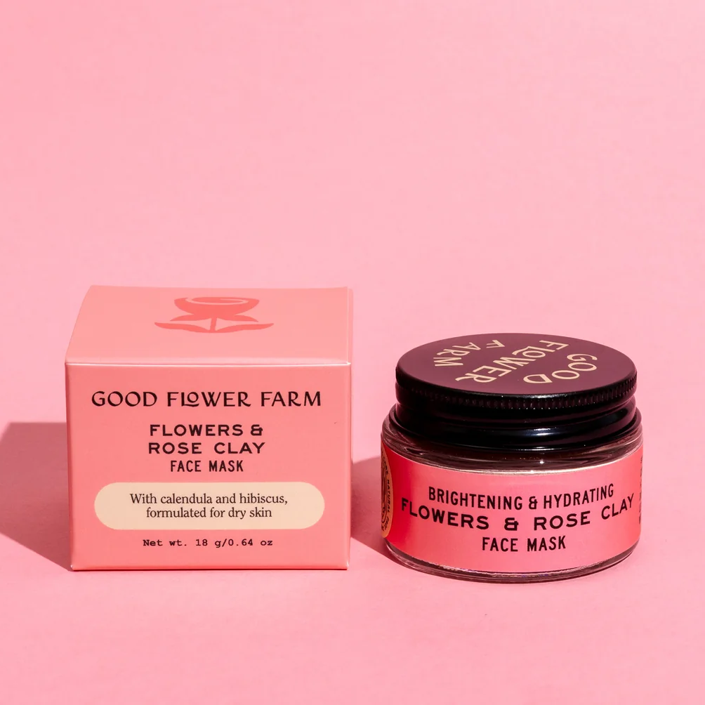 Good Flower Farm face mask jar and box on a pink background. Available at Luca Essentials in Los Angeles. 