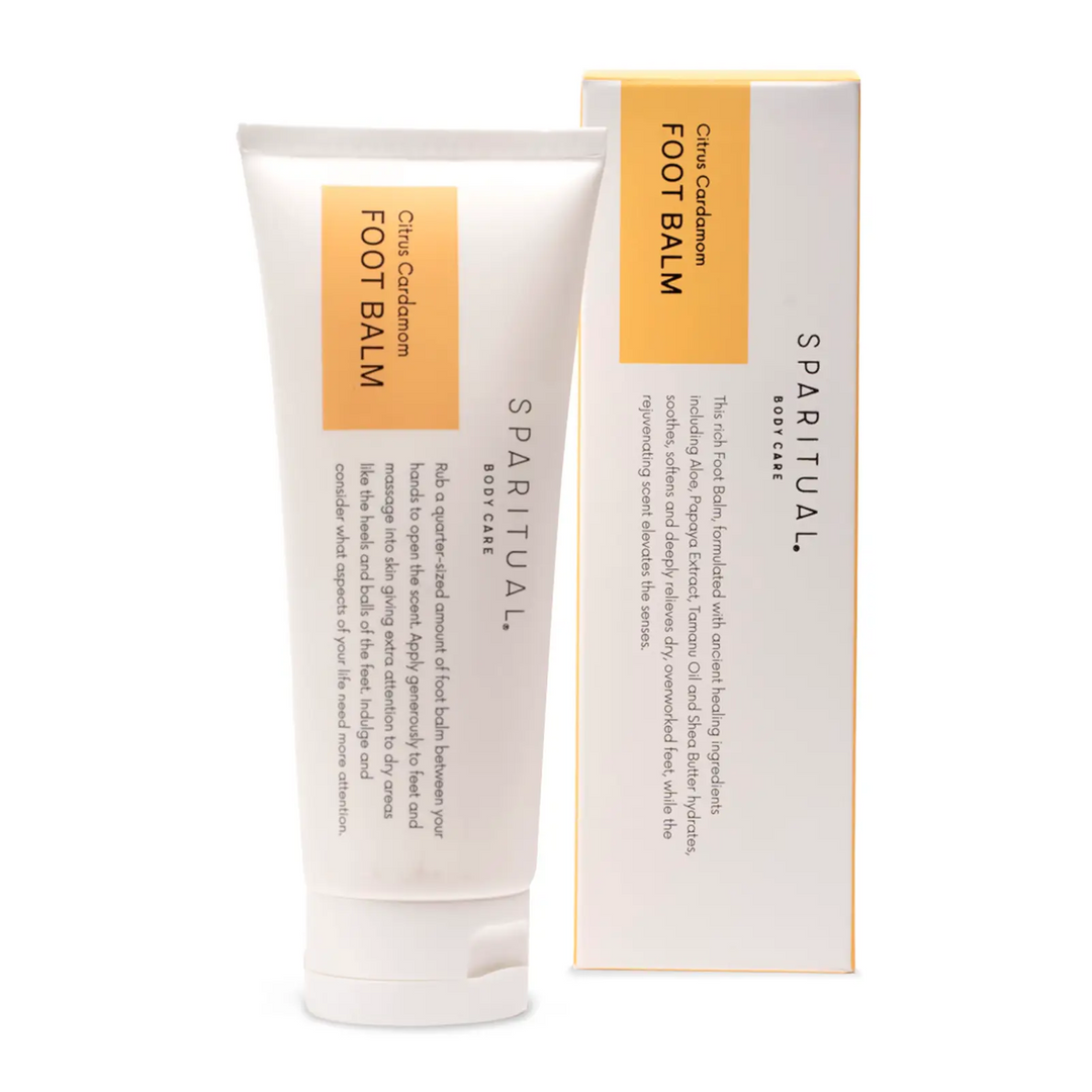 white and orange Sparitual foot balm tube and packaging on a white background. Available at Luca Essentials in Los Angeles. 