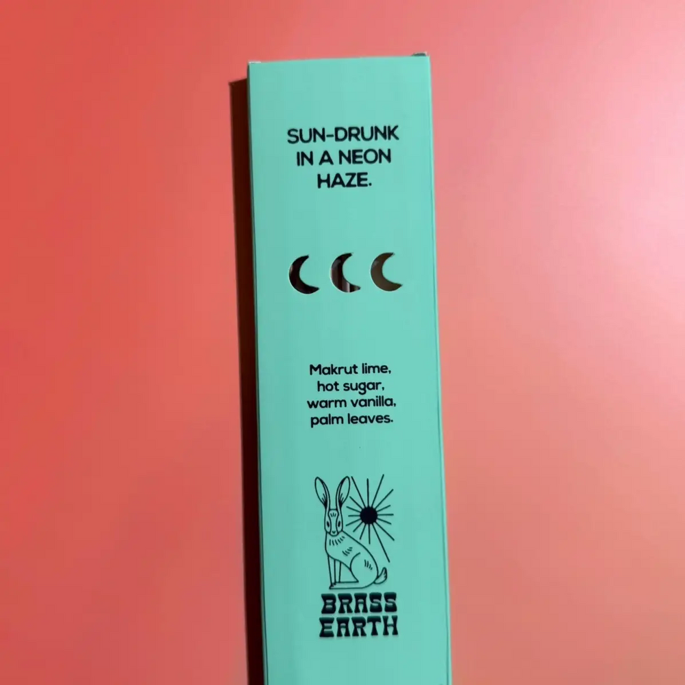 Teal product packaging with black text and branding on a gradient background. Available at Luca Essentials in Los Angeles. 