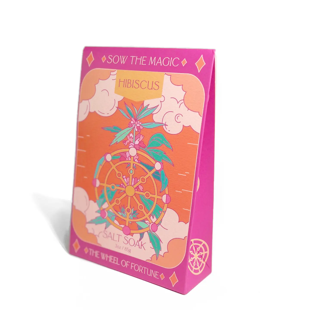 Packaged product with colorful design and text on a white background

Turn the wheel of destiny with Hibiscus and The Wheel of Fortune, a luxurious soak symbolizing gratitude and transformation. The vibrant floral scent uplifts your energy while mineral salts relax and align body and mind.

Available at Luca Essentials in Los Angeles. 