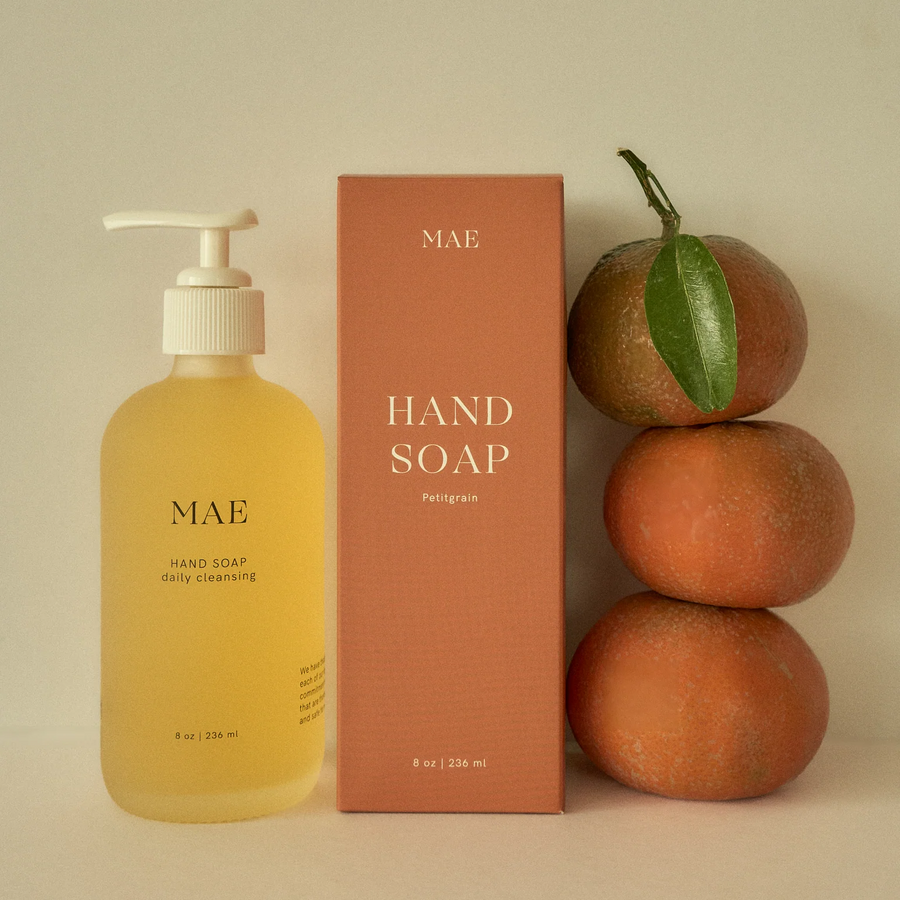 Mae hand soap bottle and packaging with oranges on a beige background.

Crafted with organic coconut, olive, and sunflower oils, this silky formula gently cleanses while replenishing the skin’s natural moisture barrier.

Available at Luca Essentials in Los Angeles. 