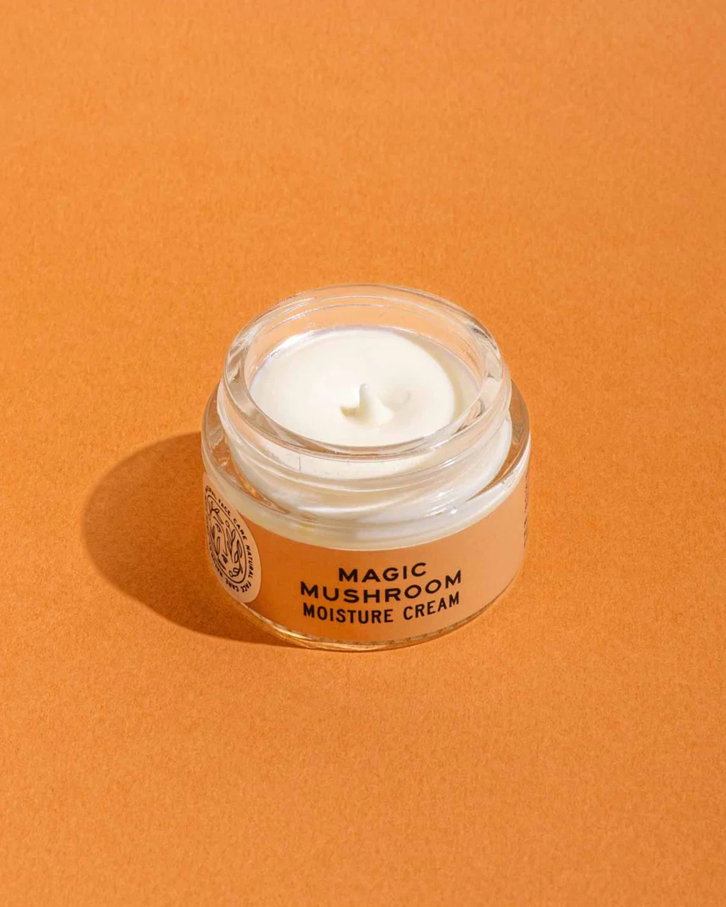 Jar of 'Magic Mushroom Moisture Cream' on an orange background.

Protect against environmental stressors and age gracefully with this deeply nourishing network of fungi, botanicals, and vitamin and essential fatty acid-rich oils. Use as a daily moisturizer before seeing the city or sun to protect your youthful glow.

Available at Luca Essentials in Los Angeles.