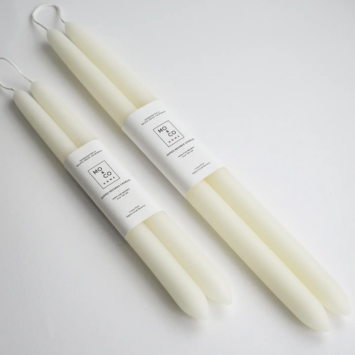 Set of white candles with labels on a light gray background

 Dipped 100% Beeswax Candles 10" or 14" Long

Available at Luca Essentials in Los Angeles. 