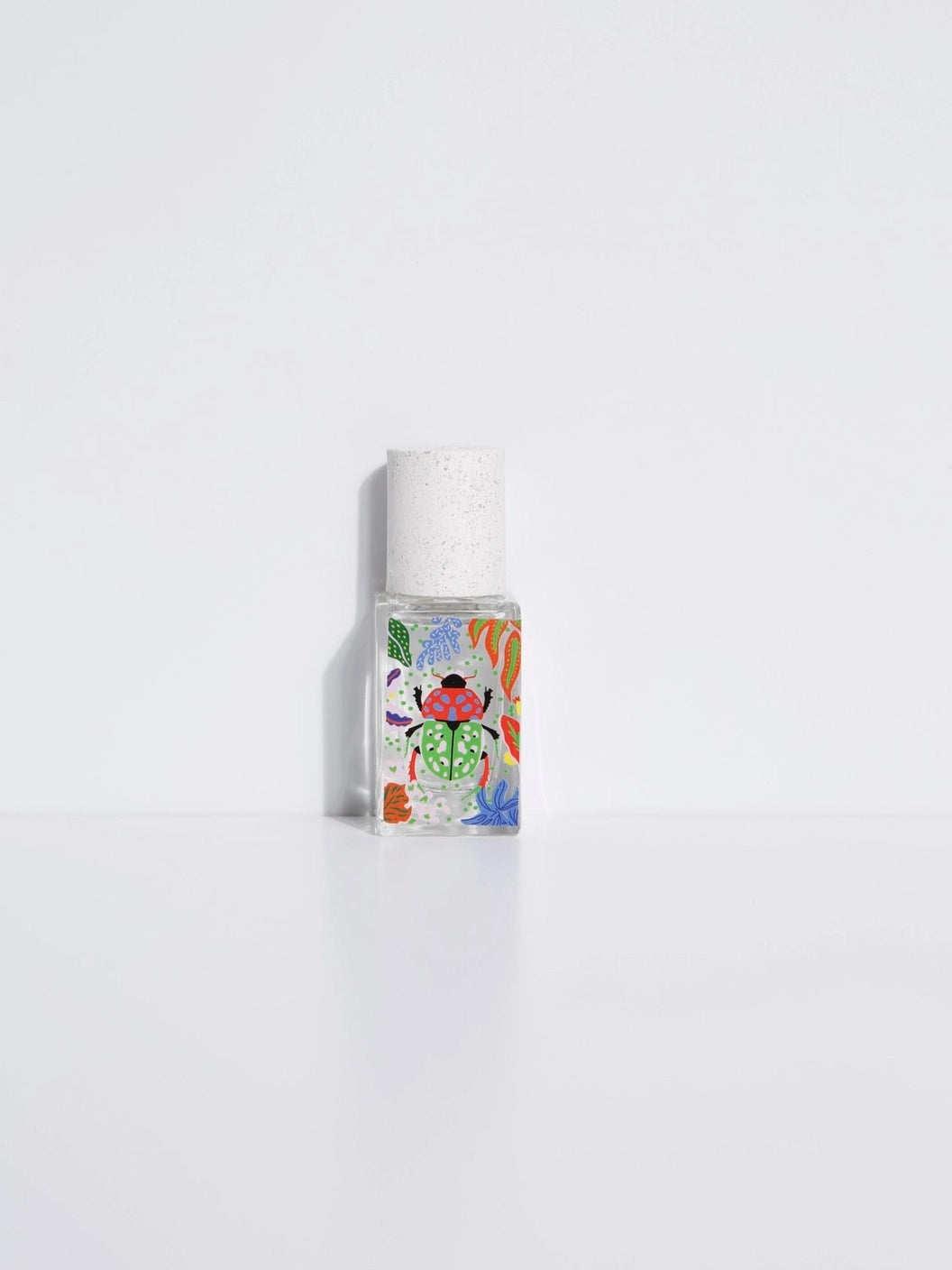 A small, clear bottle of Maison Matine perfume with a white label depicting a colorful beetle with cap, presented against a white background.

Maison Matine perfumes each have their own refreshing scent. The unisex, fresh, unique fragrances are created by eclectic, talented, creative perfumers.

Available at Luca Essentials in Los Angeles. 