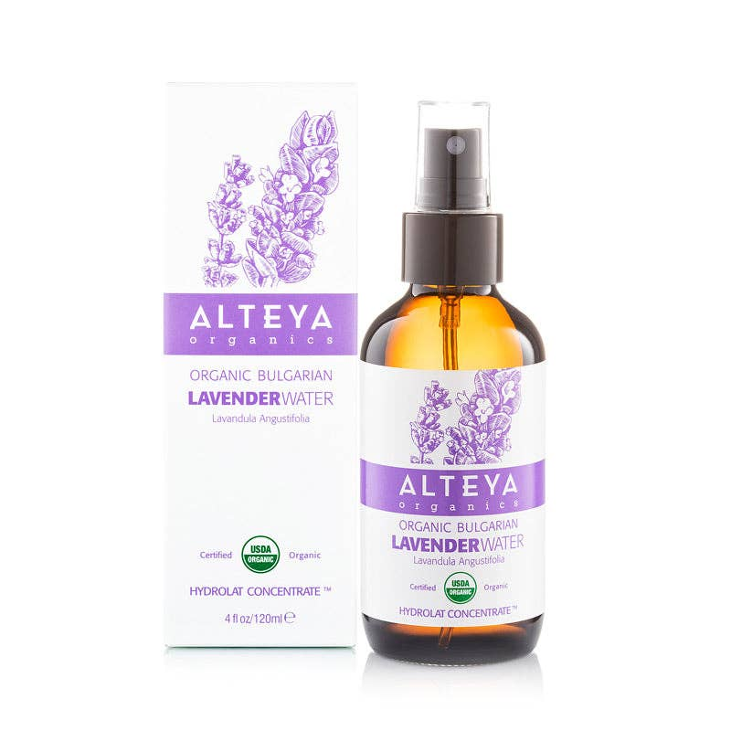 A spray bottle of Alteya Organic Lavender Water, with the packaging box behind it, displaying the product as organic on a white background. Available at Luca Essentials in Los Angeles. 