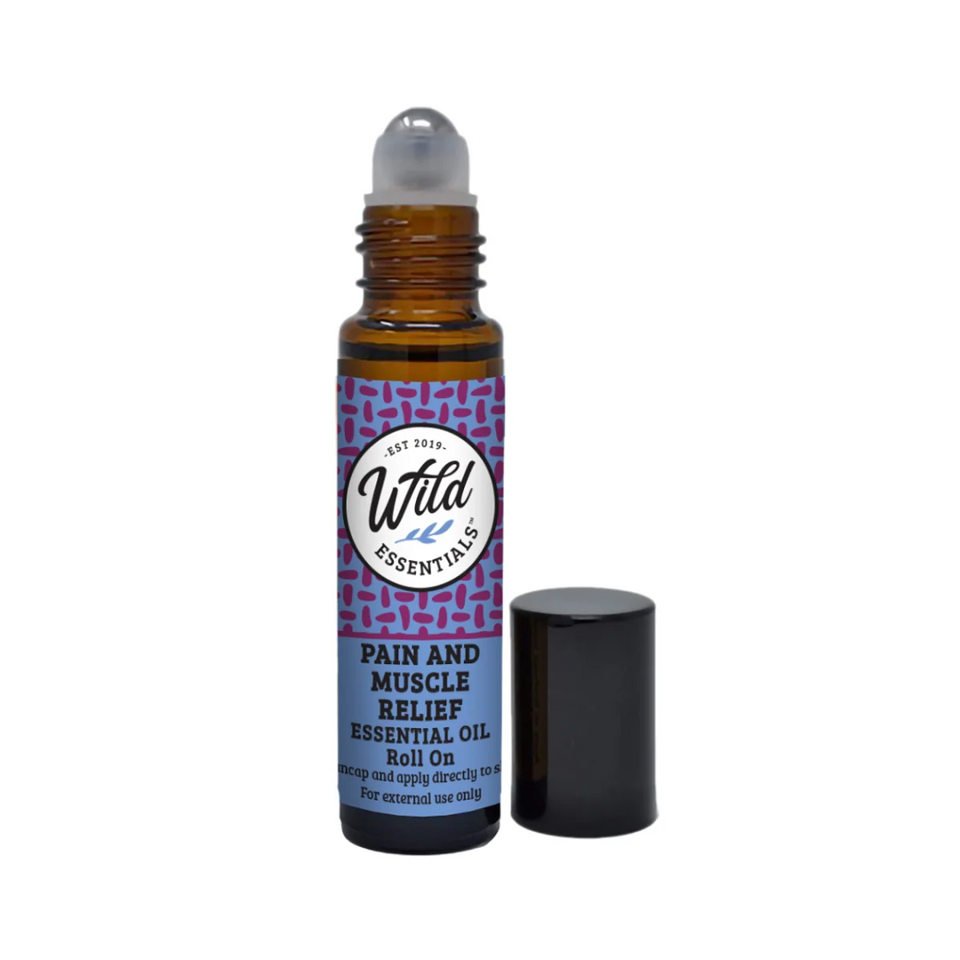 Roll-on bottle of Wild Essentials Pain and Muscle Relief Essential Oil on a white background. Available at Luca Essentials in Los Angeles.