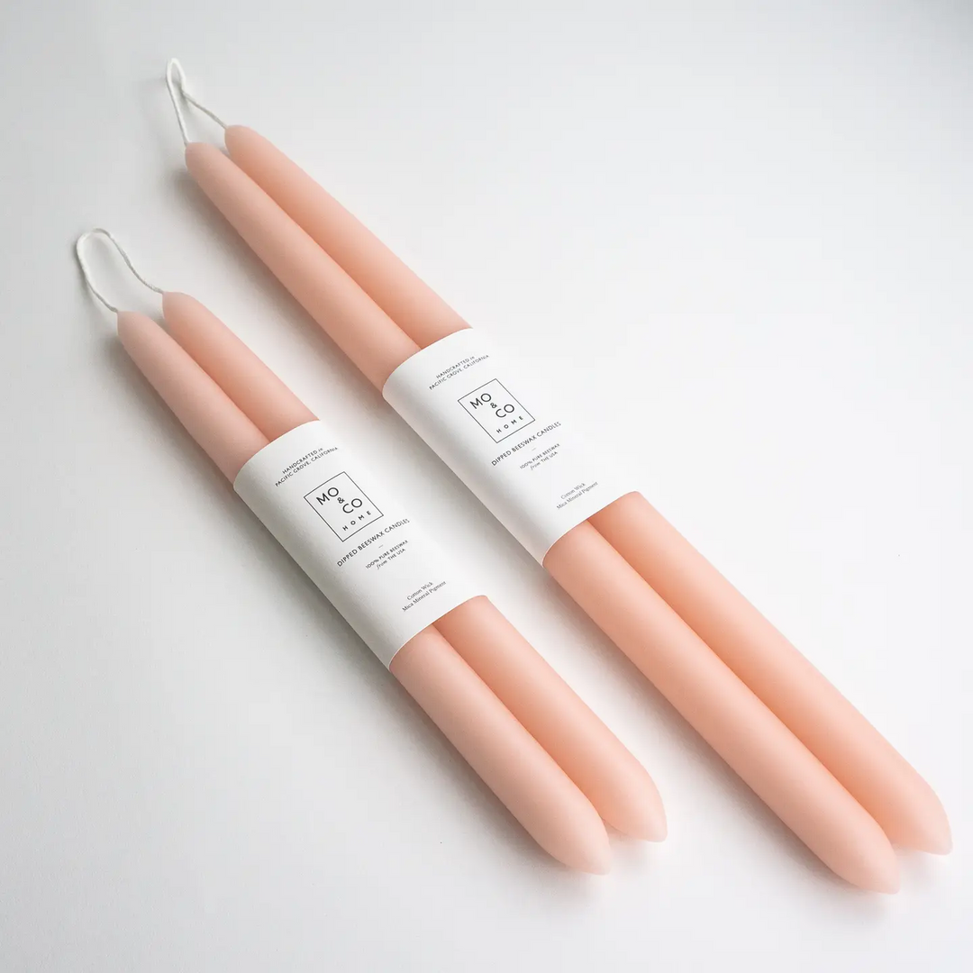 Set peach-colored candles with white labels on a light gray background

Dipped 100% Beeswax Candles 10" or 14" Long

Available at Luca Essentials in Los Angeles. 