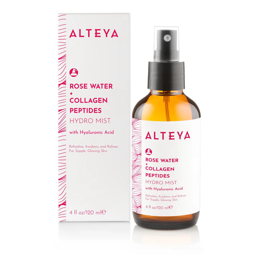 Alteya Rose Water Collagen Peptides Hydro Mist, with hydrolyzed collagen peptides, in a clear spray bottle with a white and pink label, next to its packaging box on a white background. Available at Luca Essentials in Los Angeles. 