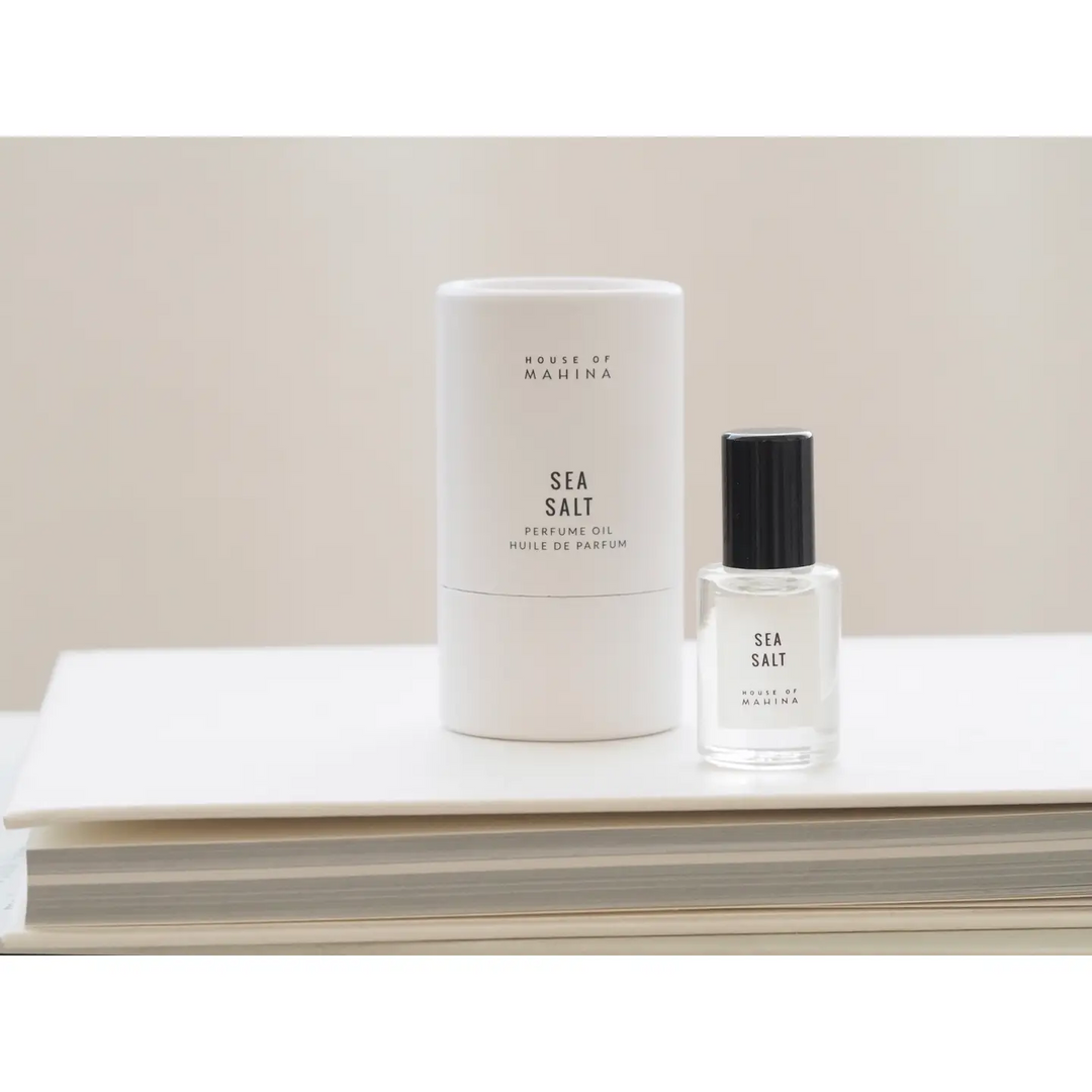 Two perfume bottles labeled 'Sea Salt' by House of Maluna on a white surface with a beige background.

Hand-blended in micro batches, our perfume oil is composed of organic fractionated coconut oil and our blend of premium phthalate-free fragrance/essential oils. 

Available at Luca Essentials in Los Angeles.
