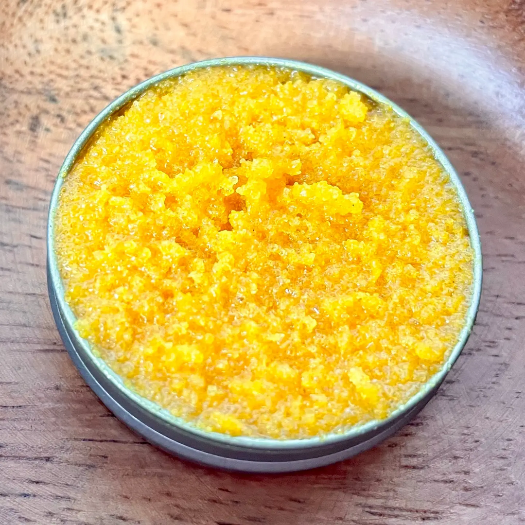 Yellow sugar scrub in a round container on a wooden surface

This lip scrub can help brighten and lighten the lips by getting rid of dead skin cells to review a brighter and lighter lips.

Available at Luca Essentials in Los Angeles.