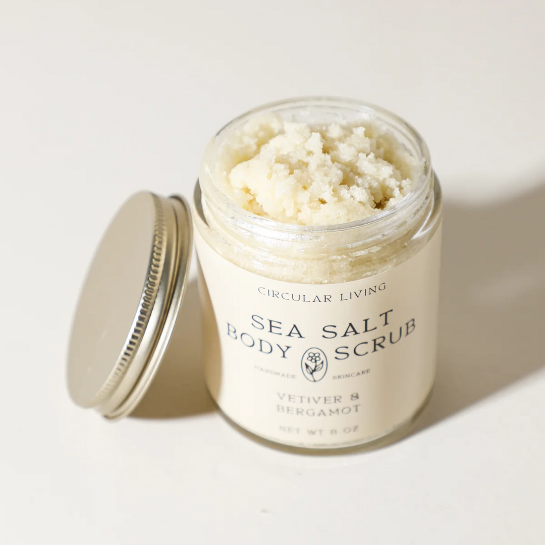 Jar of sea salt body scrub with visible brand name on a light background. Available at Luca Essentials in Los Angeles. 