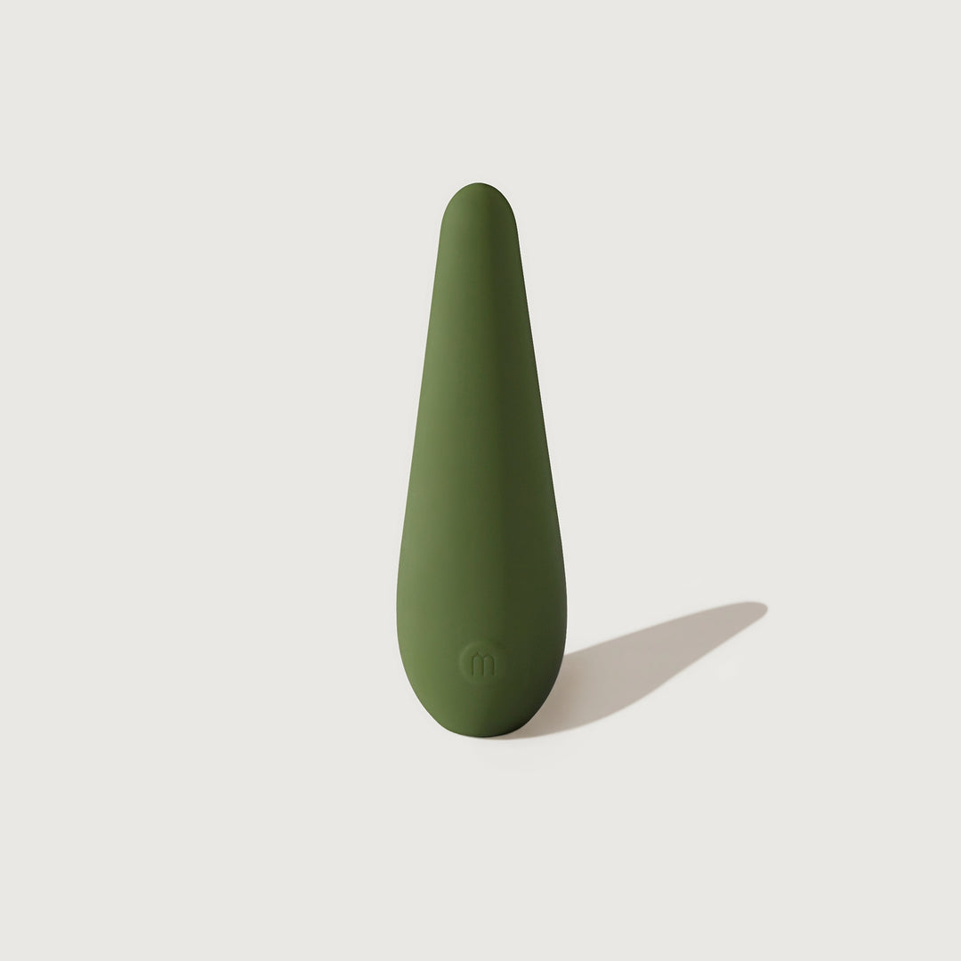 Green sleek electrical device on a white background. 

Vibe is a discreet, easy-to-use 3-speed personal massager made with 100% soft-touch silicone. 

Available at Luca Essentials in Los Angeles. 