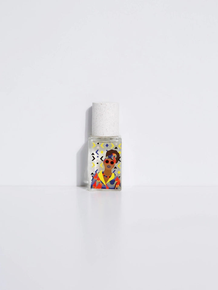 A small, clear bottle of Maison Matine perfume with a white label depicting a woman with geometric background with cap, presented against a white background.

Maison Matine perfumes each have their own refreshing scent. The unisex, fresh, unique fragrances are created by eclectic, talented, creative perfumers.

Available at Luca Essentials in Los Angeles. 
